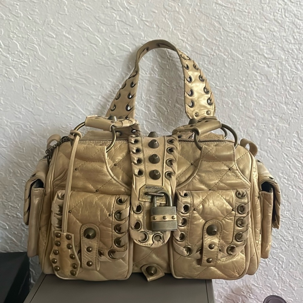 Never Used gold with studs handbag